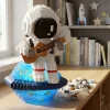astronaut playing guitar toy, astronaut assembly toy